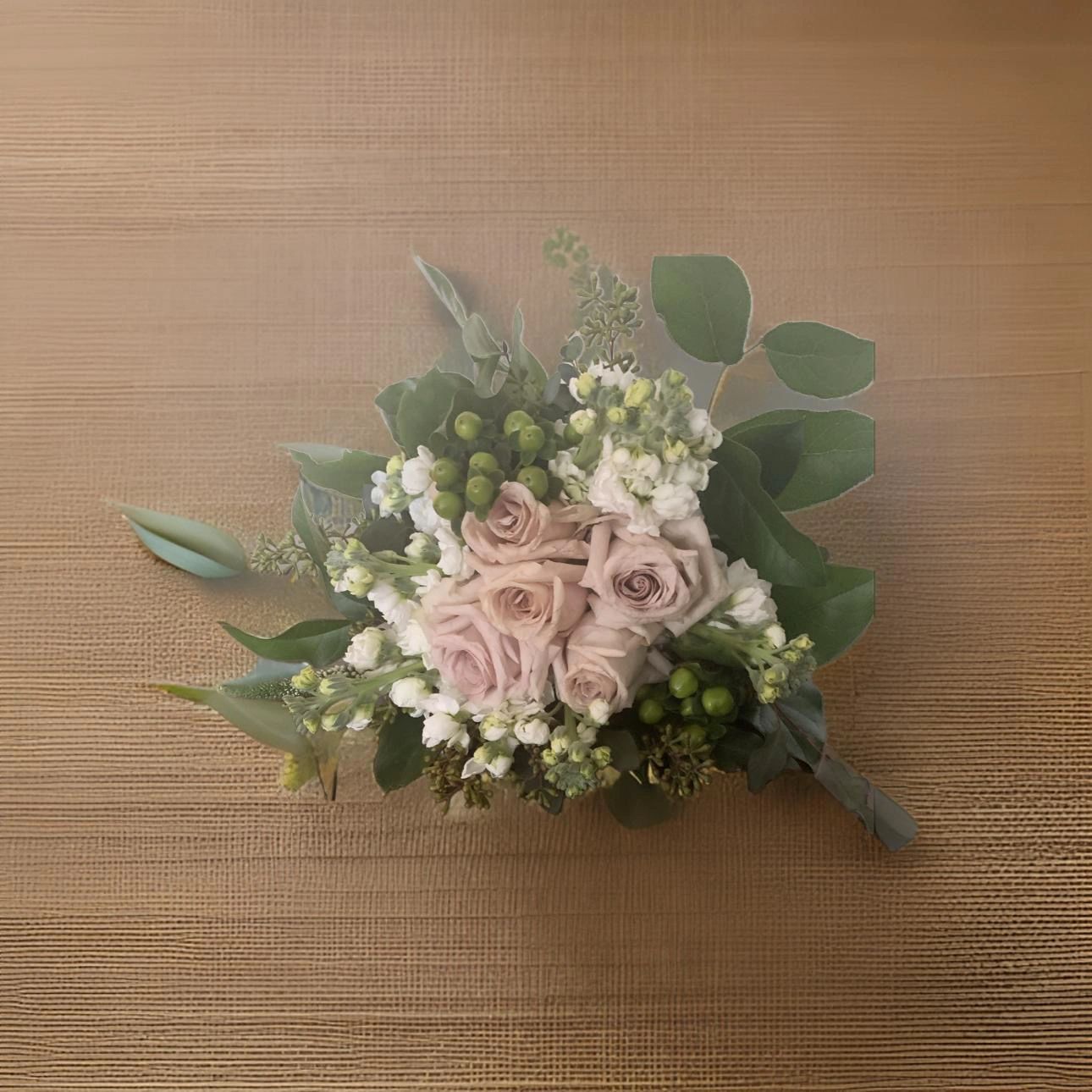 Delicate mauve roses bouquet flat lay