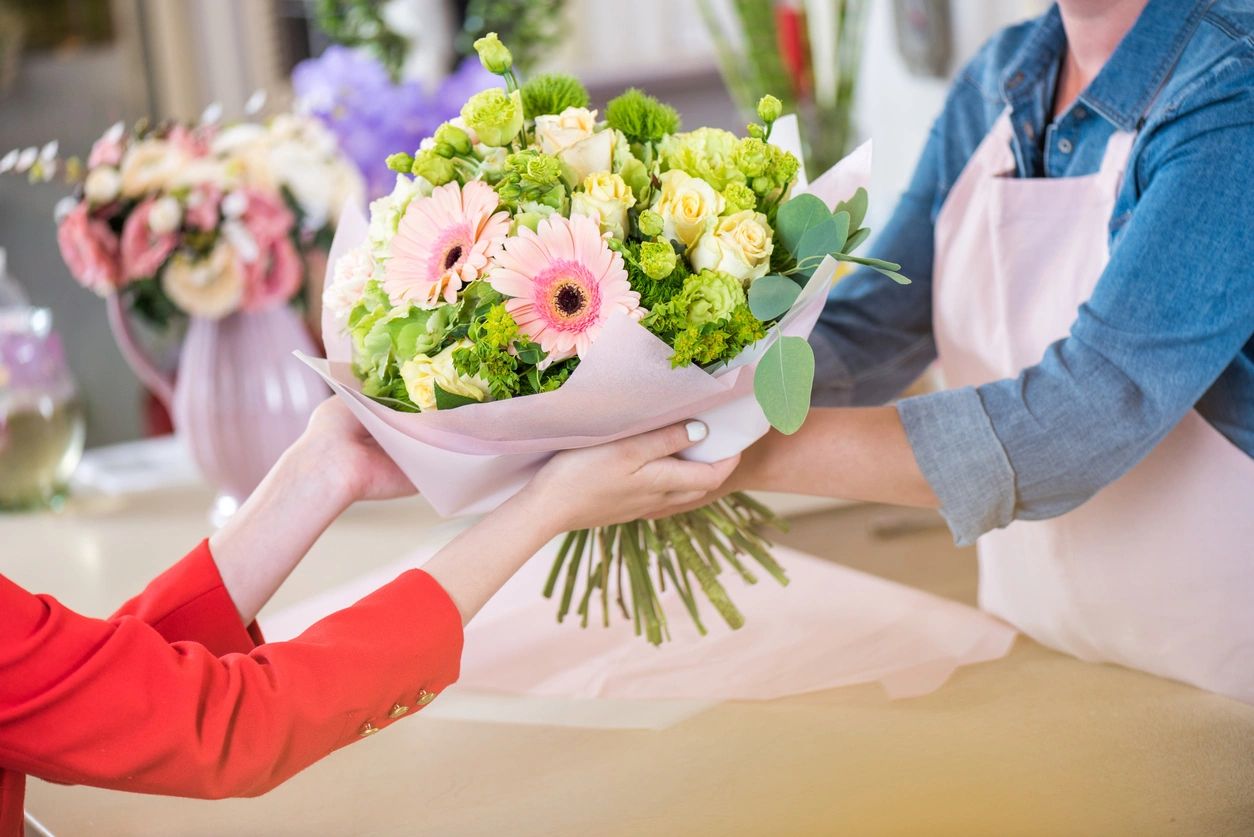 Florist woman in flower shop