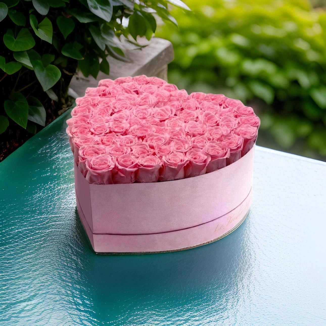 Heart shaped box with pink roses